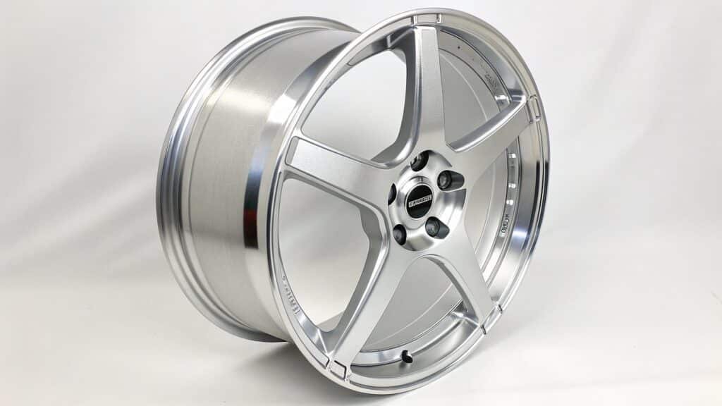 An image showing a material specification sheet where alloy components are listed by their chemical symbols: Al, Si, Mg, Cu, etc., with 'Al' having the highest percentage.